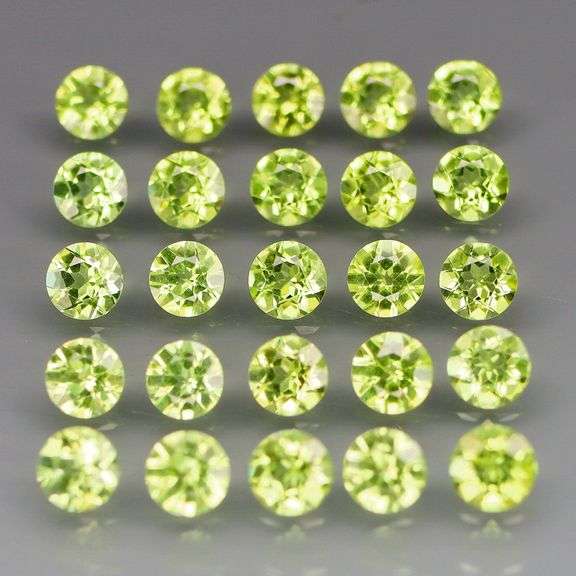 Dazzling 4.62ct untreated super clean apple green Peridot set