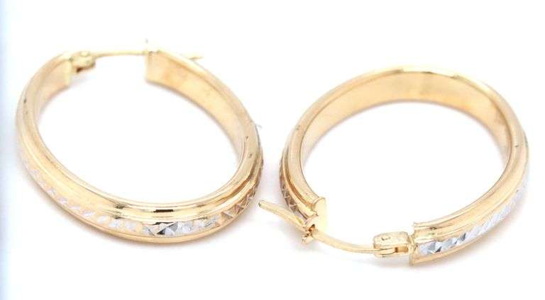 14kt Yellow gold diamond cut oval hoop earrings