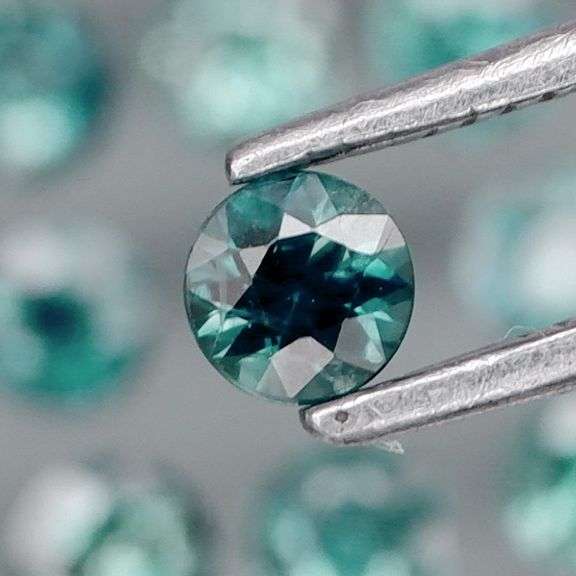 Heated only! 3.14ct blue green Sapphire set