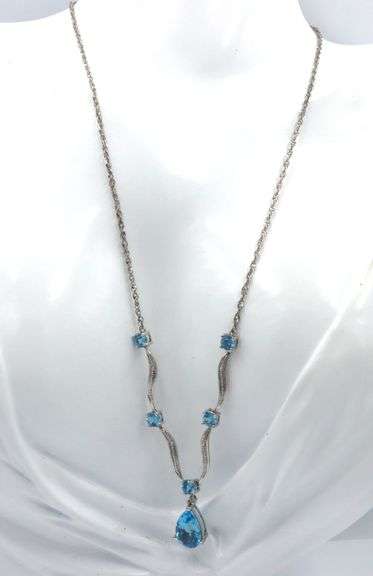 10kt White gold round and pear shaped blue topaz station V necklace