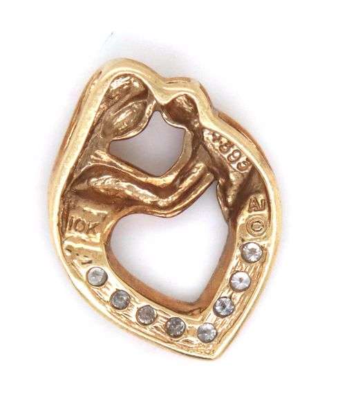 Set of 10kt Yellow gold mother and child diamond ring and pendant