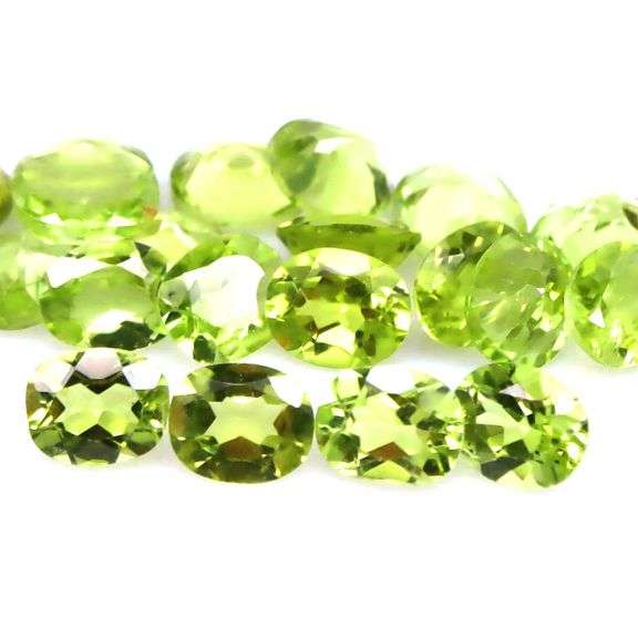Dazzling 9.20ct untreated apple green Peridot set