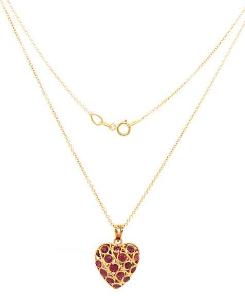 18kt Yellow gold reversible sapphire and ruby heart shaped pendant on chain