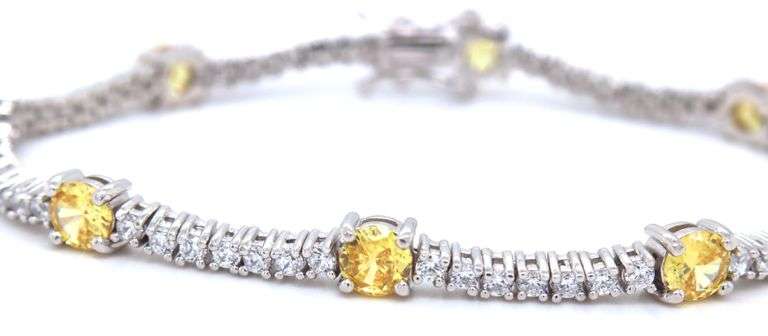 Round brilliant yellow and white cubic zirconia tennis bracelet in 925 sterling silver