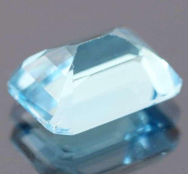 Stunning 9.48ct 13.8x10mm emerald cut  Swiss blue Topaz