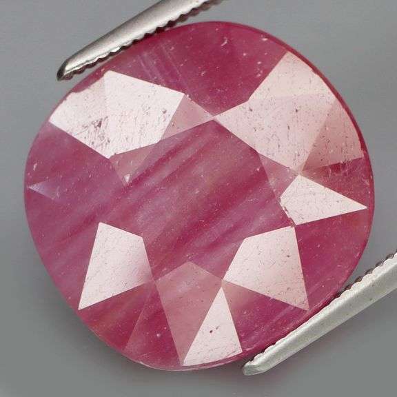 Holy cow! It’s a 19.38ct silver pinkish red striped Ruby! And its UNTREATED!