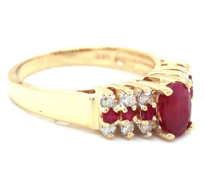 14kt Yellow gold round and oval ruby and diamond dome ring
