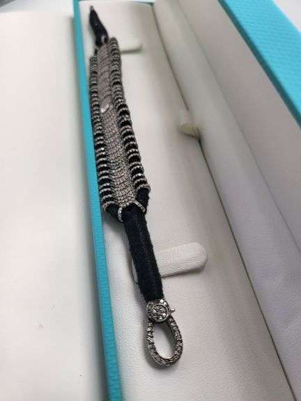Very unique diamond bracelet in silver, hand woven cloth