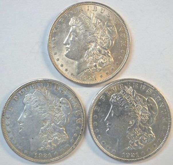 Upper end 1921 P-D-S last year Morgan Silver Dollars