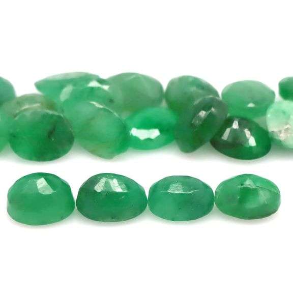 Vivid color in this 8.67ct Zambian Emerald set