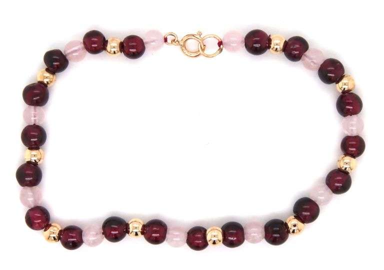 Rose quartz and gold beaded bracelet in yellow gold