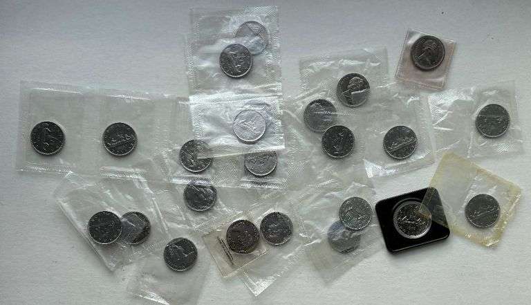 Twenty Five Mainly 1968 1969 Sealed Unc Canadian Dollars.