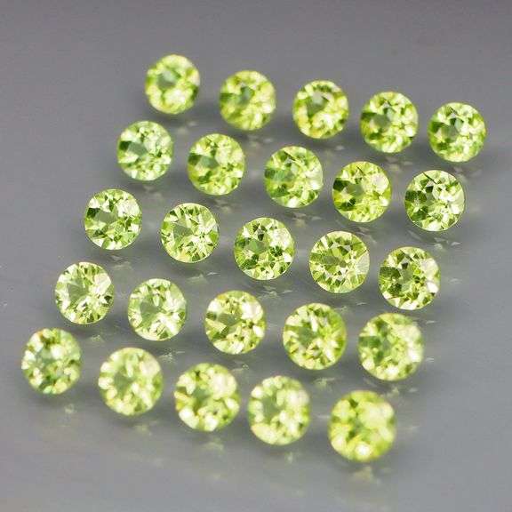 Dazzling 4.62ct untreated super clean apple green Peridot set