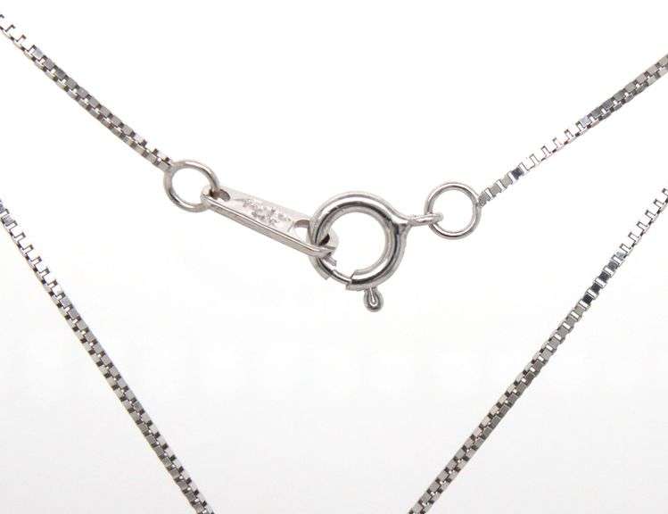 14kt White gold blue sapphire and diamond pendant on chain