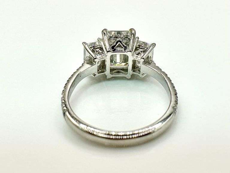 Sparkling 5.5 Ctw 3 Stone Emerald Cut Ice White Fire Moissanite Ring