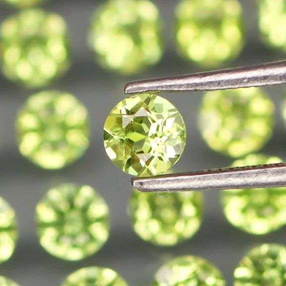 Dazzling 4.62ct untreated super clean apple green Peridot set