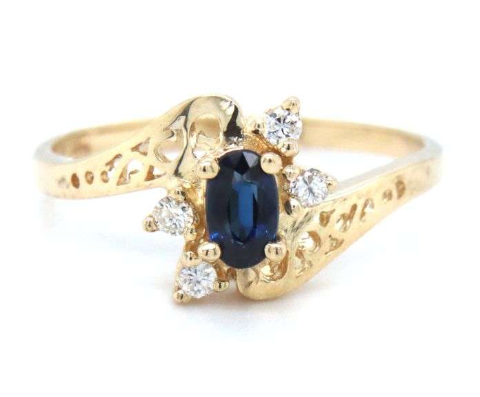 14kt Yellow gold oval sapphire and diamond ring