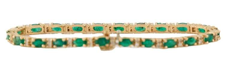 5.50ctw Oval Emerald and 0.65ctw Diamond Accent Tennis Bracelet in 14K