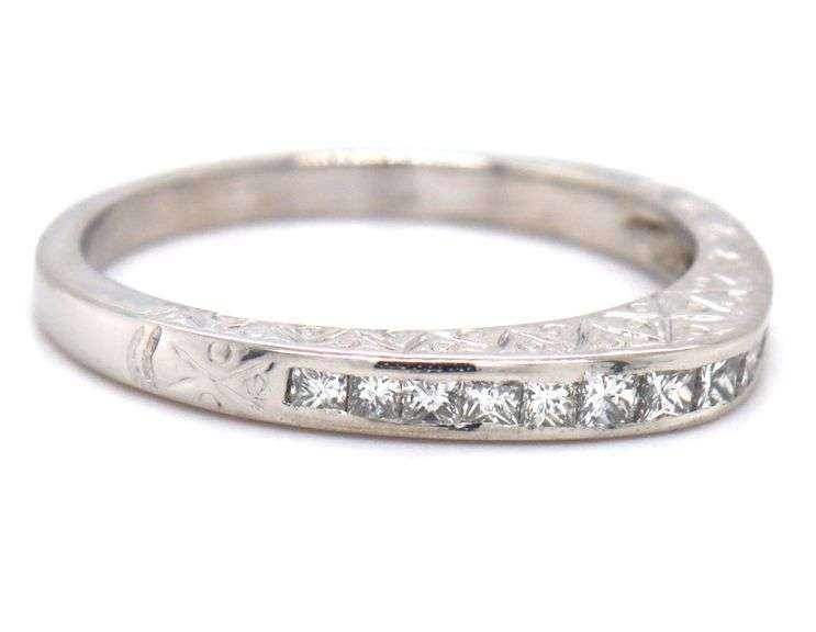 Platinum 0.75ctw channel set princess cut diamond dome ring