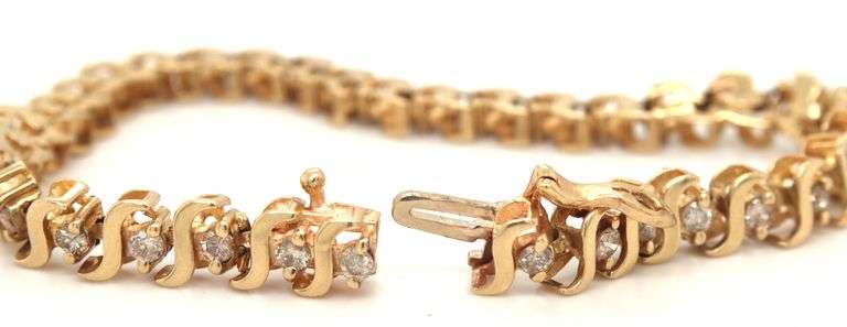 14kt Yellow gold round brilliant cut diamond S link bracelet