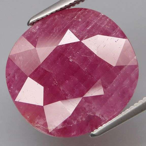 Classic cushion cut! Swirling saturation! 15.20ct Winza Ruby!