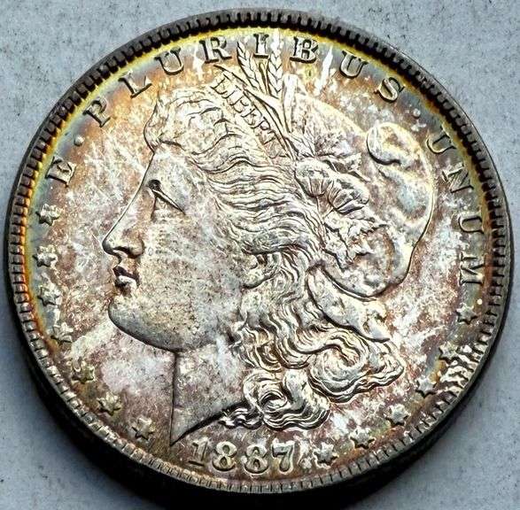 1887 Toned Unc BU Morgan