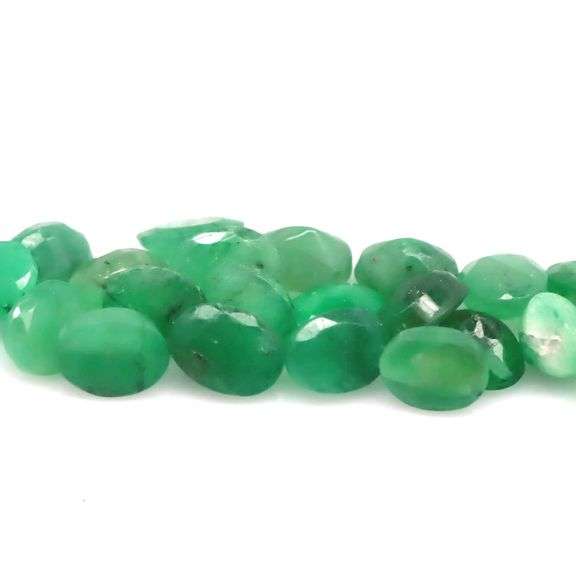 Vivid color in this 8.67ct Zambian Emerald set