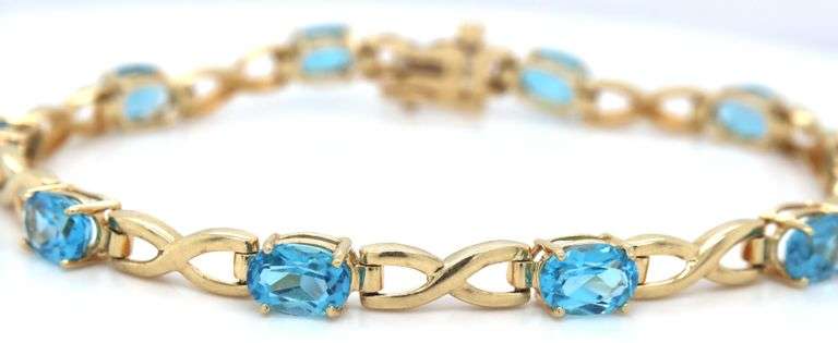 14kt Yellow gold oval blue topaz bracelet