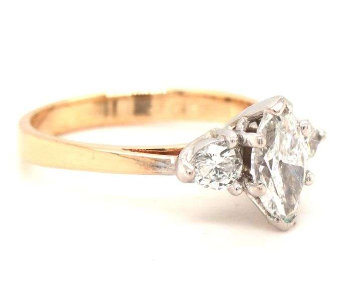 14kt Yellow gold 0.81ct marquise and 0.30ctw princess cut 3 stone diamond engagement ring