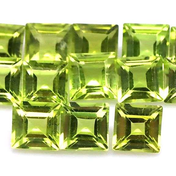 High fire brightly colored 9.55ct Peridot set!
