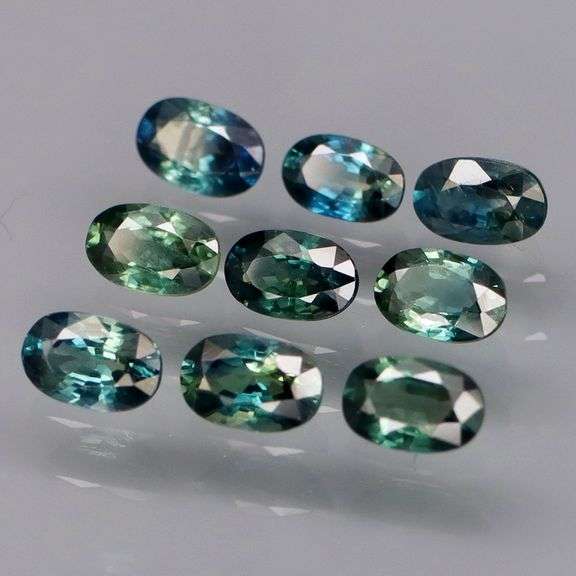 Heated only! 3.23ct blue green Sapphire set