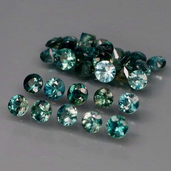 Heated only! 3.30ct blue green Sapphire set!