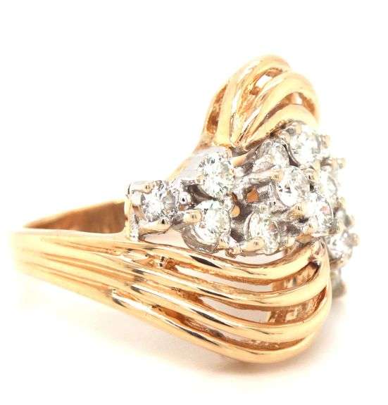 14kt Yellow gold 1.15ctw diamond cluster ring with a bypass shank
