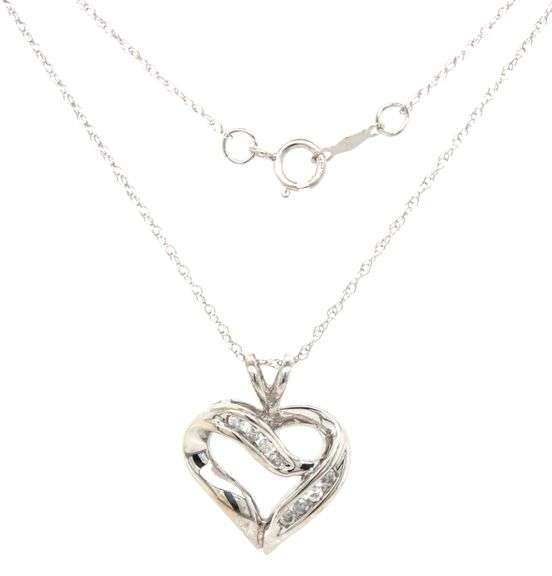 10kt White gold diamond heart shaped pendant on chain