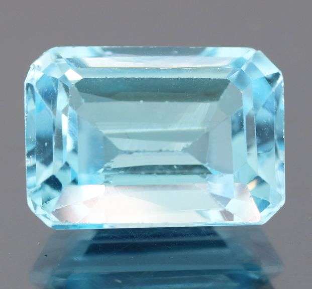 Stunning 9.48ct 13.8x10mm emerald cut  Swiss blue Topaz