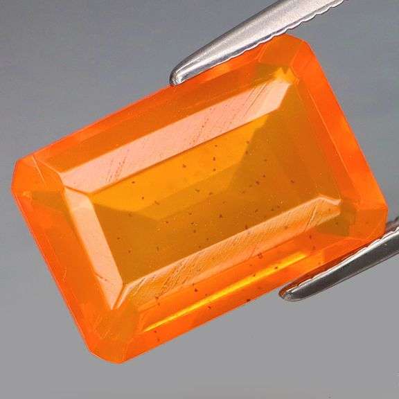 Incredible color in this 3.65ct tangerine orange Fire Opal!