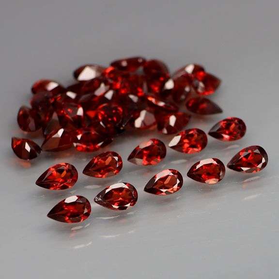 Premium 10.06ct pear cut cherry red Mozambique Garnet set!
