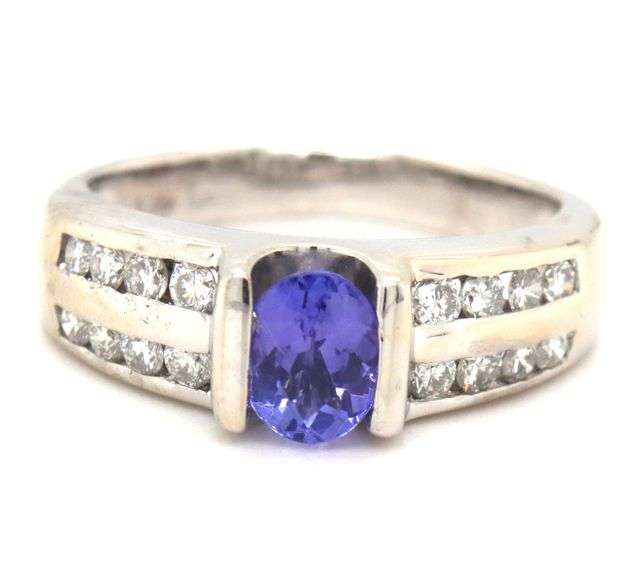 14kt White gold oval Tanzanite and 2 row channel set diamond ring