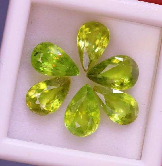 Collectors 5.67ct vivid lime green Sphene set