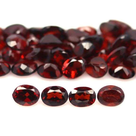 Amazing 12.30ct oval cut red Garnet set