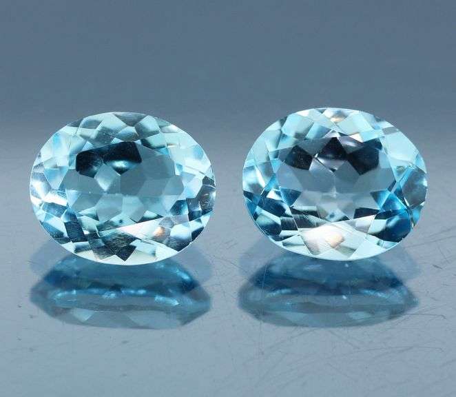 Huge! 12x10mm pair of swiss blue Topaz weighing 9.10 carats!