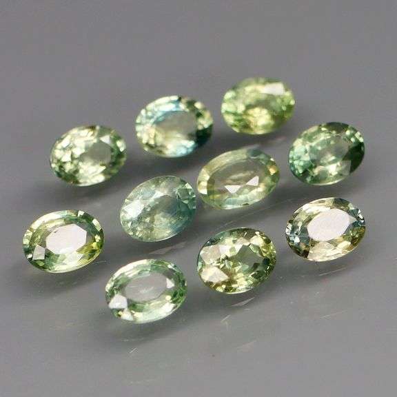 Exotic 2.20ct 14pc single vein blue green Sapphire set