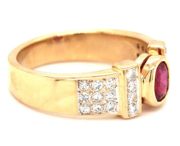 14kt Yellow gold 0.50ct oval ruby and 0.25ctw diamond ring