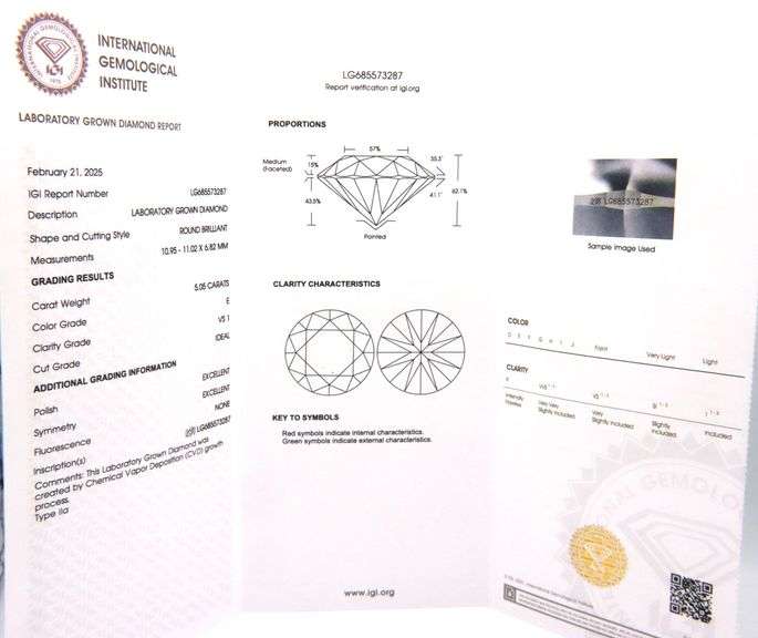18kt White gold 5.05ct lab grown round brilliant cut with 2.65ctw halo with pave diamond setting