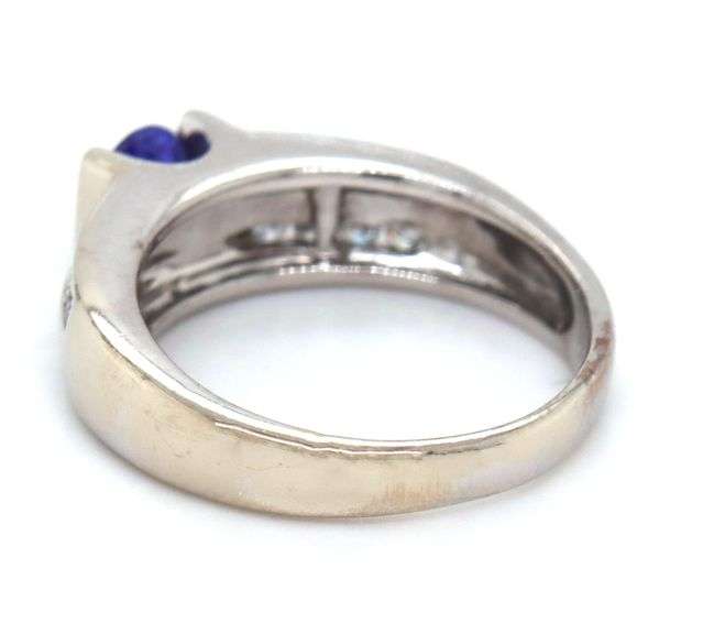 14kt White gold oval Tanzanite and 2 row channel set diamond ring