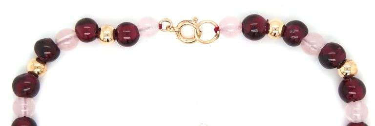 Rose quartz and gold beaded bracelet in yellow gold