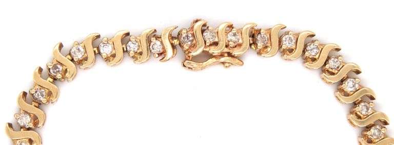 14kt Yellow gold round brilliant cut diamond S link bracelet