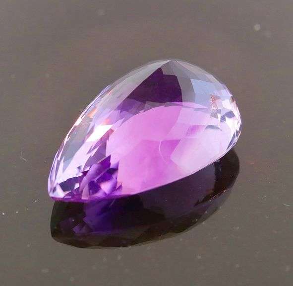 Substantial pear cut 43.03ct violet Amethyst