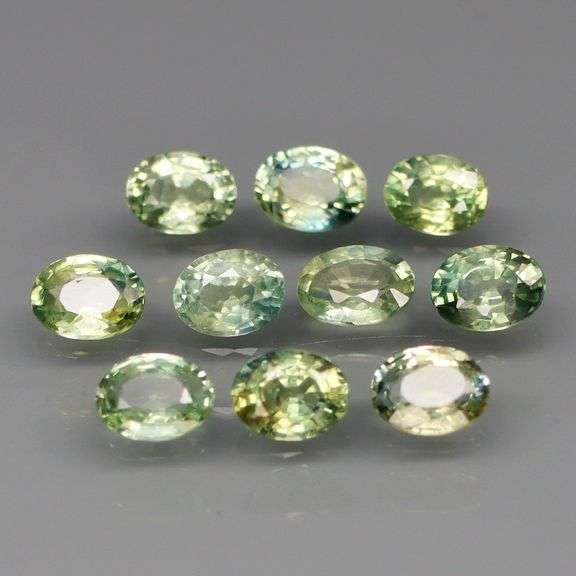 Exotic 2.20ct 14pc single vein blue green Sapphire set