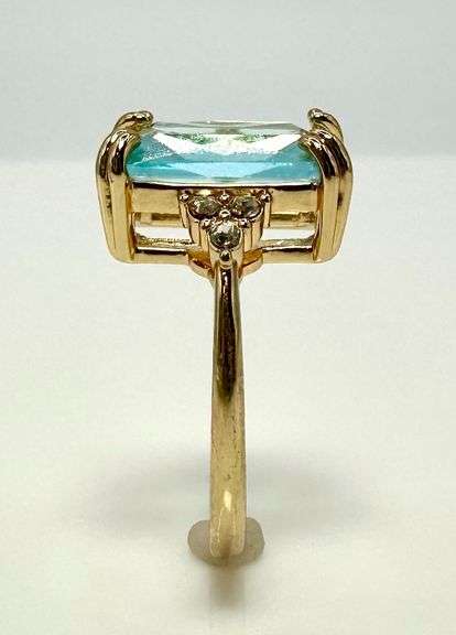 Breathtaking 14 kt Yellow Gold Plate 6.5 Ct Emerald Cut Simulated Sky Blue Topaz Ring
